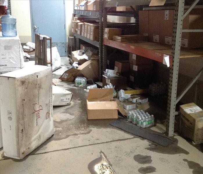 Warehouse space flooded with outside water, there were a significant amount of contents that were also effected.