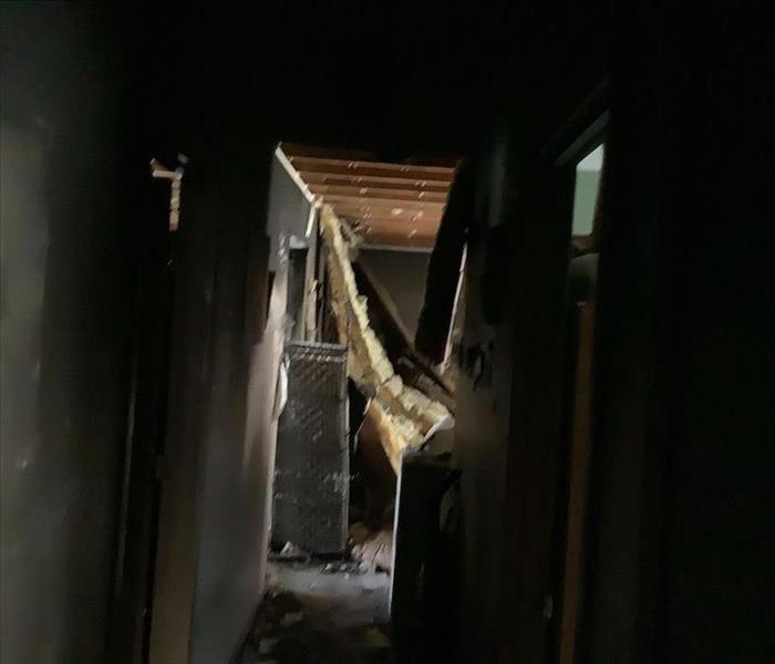 A hallway damaged by a fire