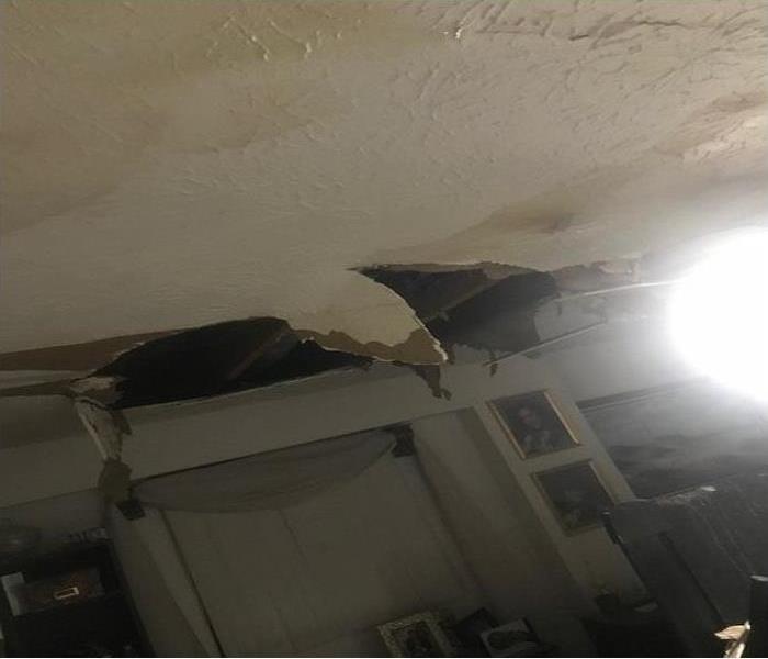 Ceilings that have fallen after a water leak on the second floor. 
