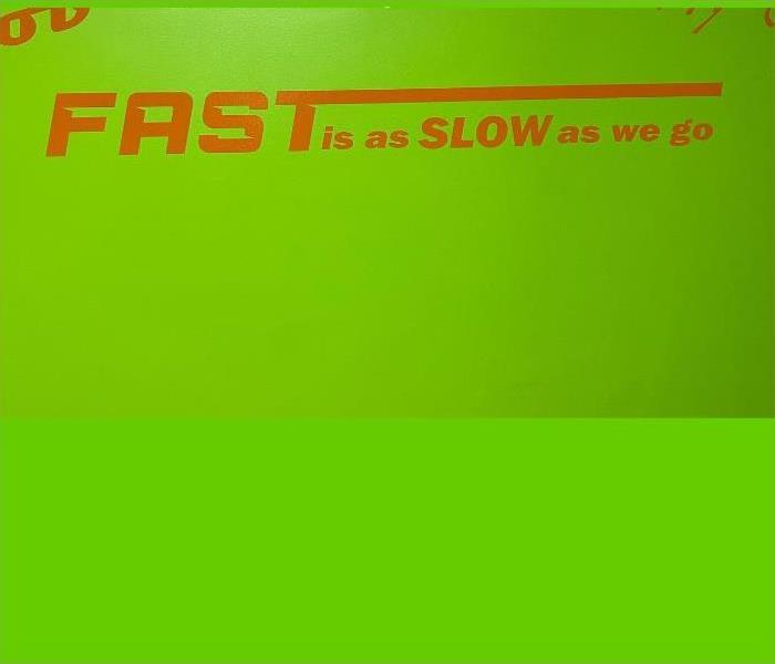 Fast is as slow as we go written on the wall 