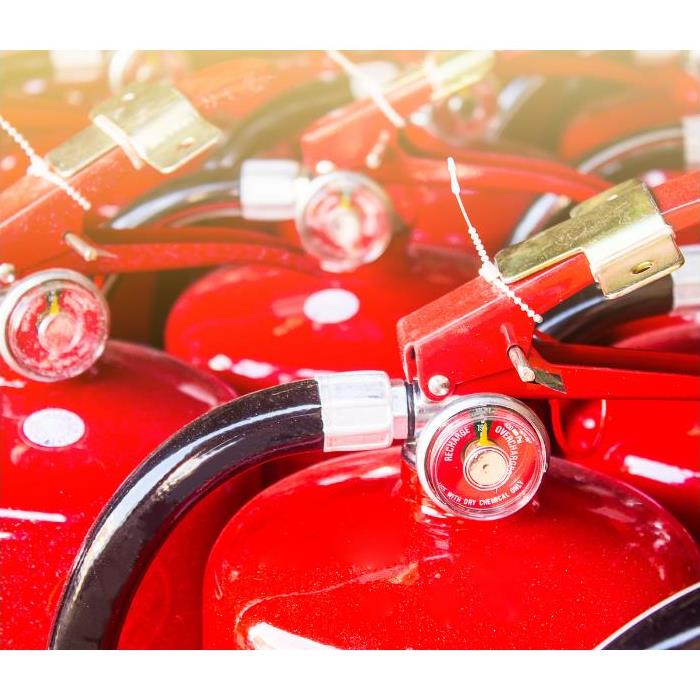 Red Fire extinguishers in a group 